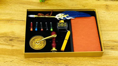 Lələk dəsti qızılı qutuda — alov qələmli