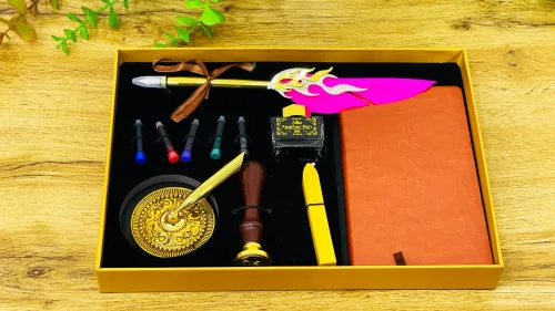 Lələk dəsti qızılı qutuda — alov qələmli